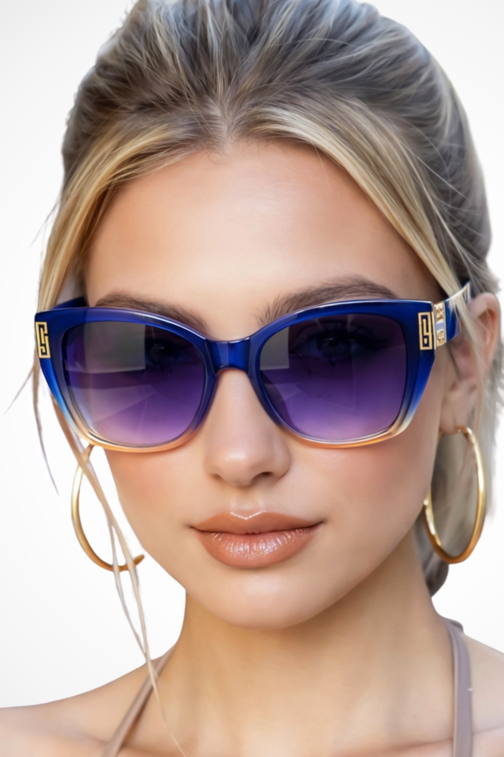 Lunettes de Soleil Femme Forme Œil de Chat et Finition Dorée aux Temples