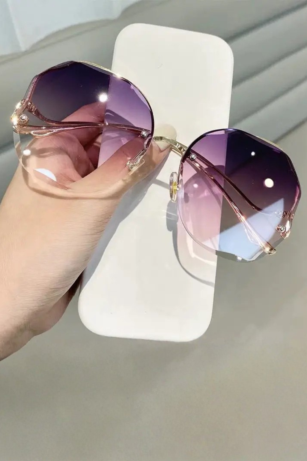 Large oversized rimless sunglasses with progressive tinted lenses