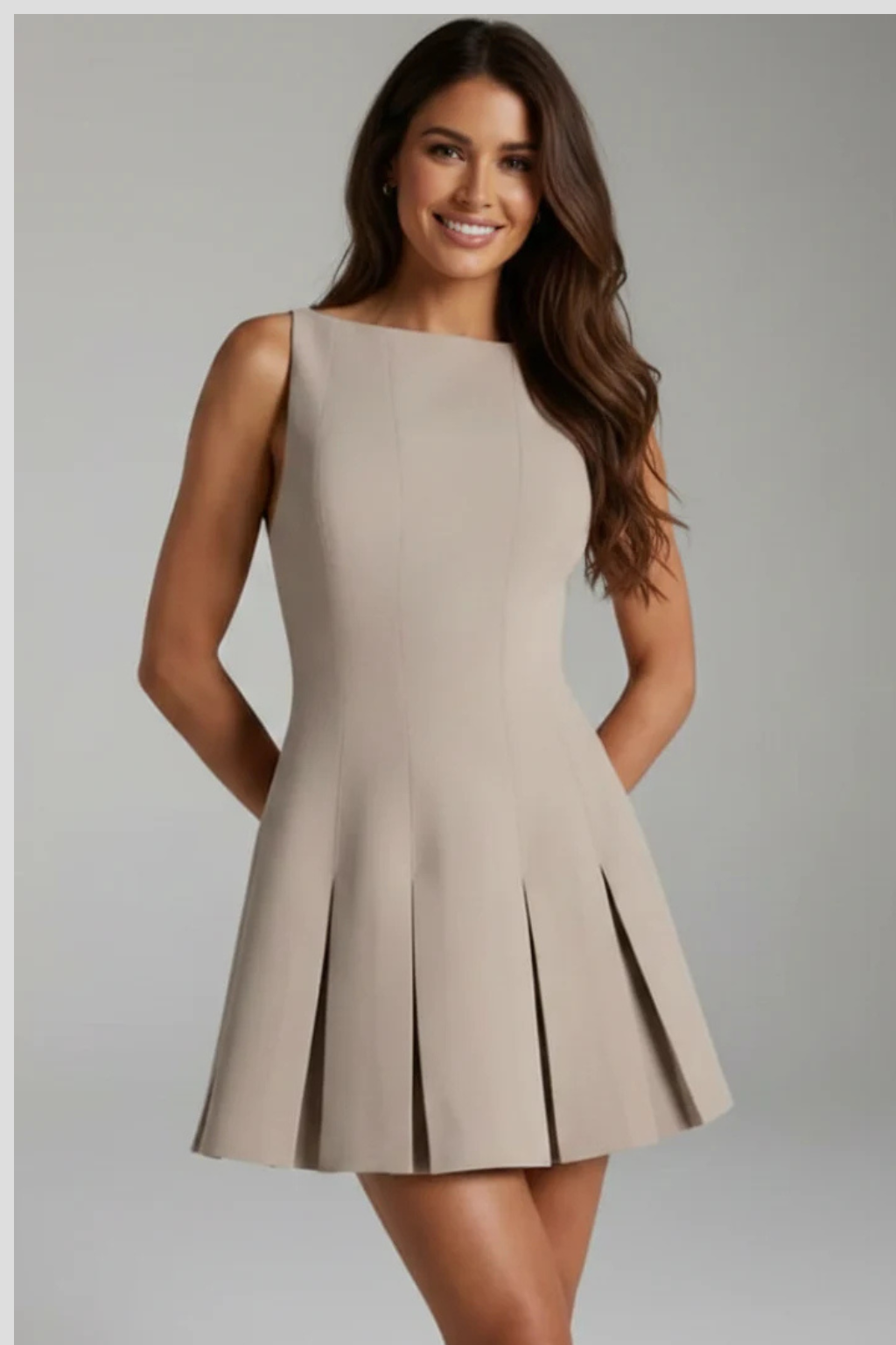 Rochie de cocktail scurtă fără mâneci, cu fustă plisată și decolteu larg