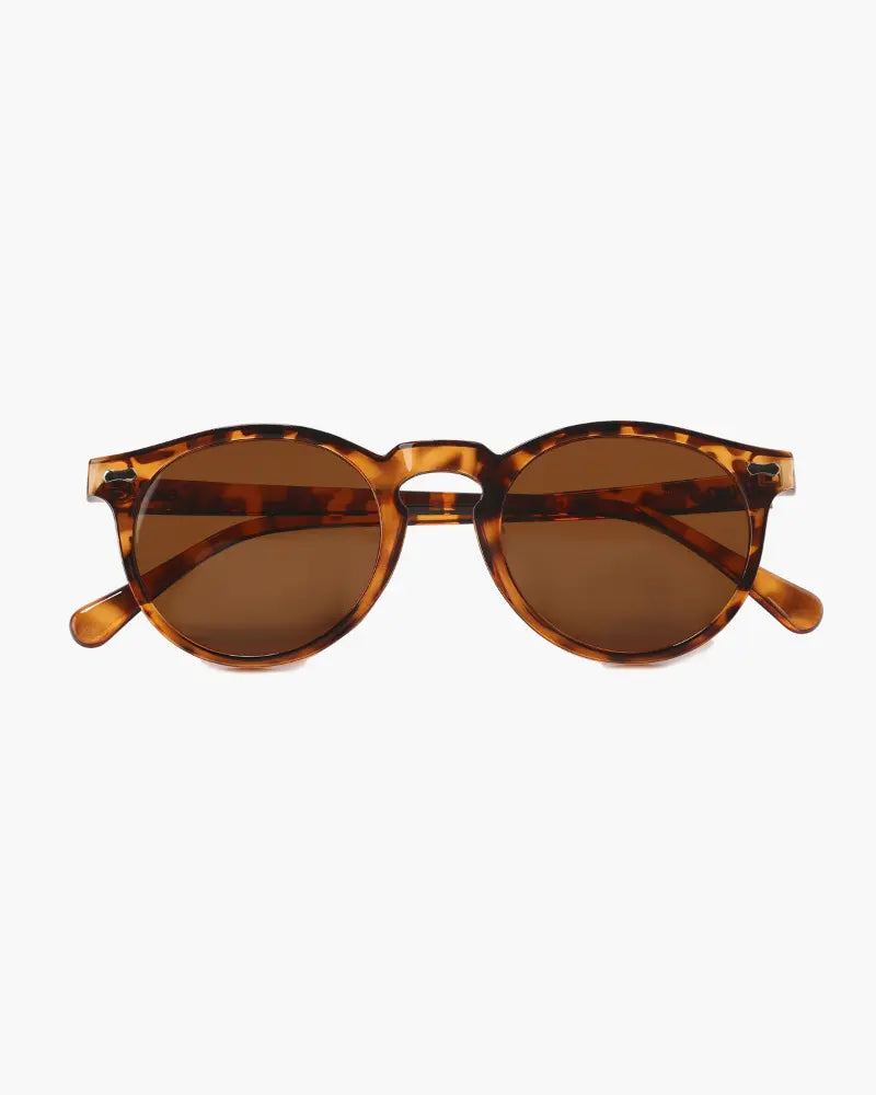 Lunettes solaires circulaires pour hommes monture légère et verres fumés UV