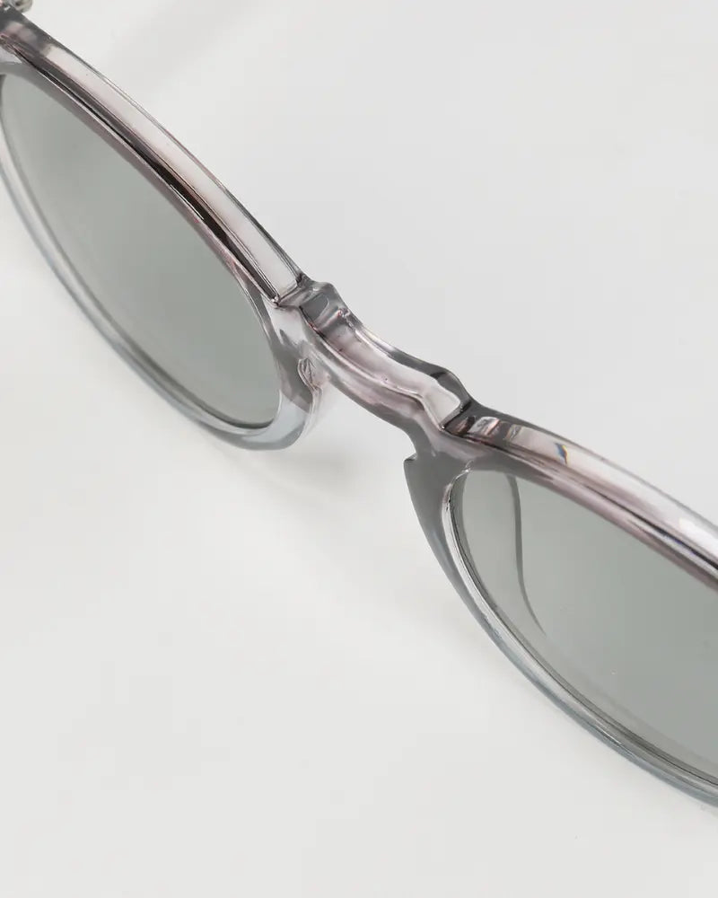Lunettes solaires circulaires pour hommes monture légère et verres fumés UV