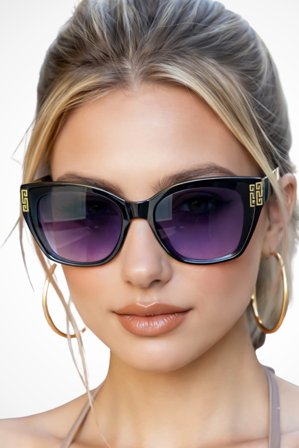 Lunettes de Soleil Femme Forme Œil de Chat et Finition Dorée aux Temples