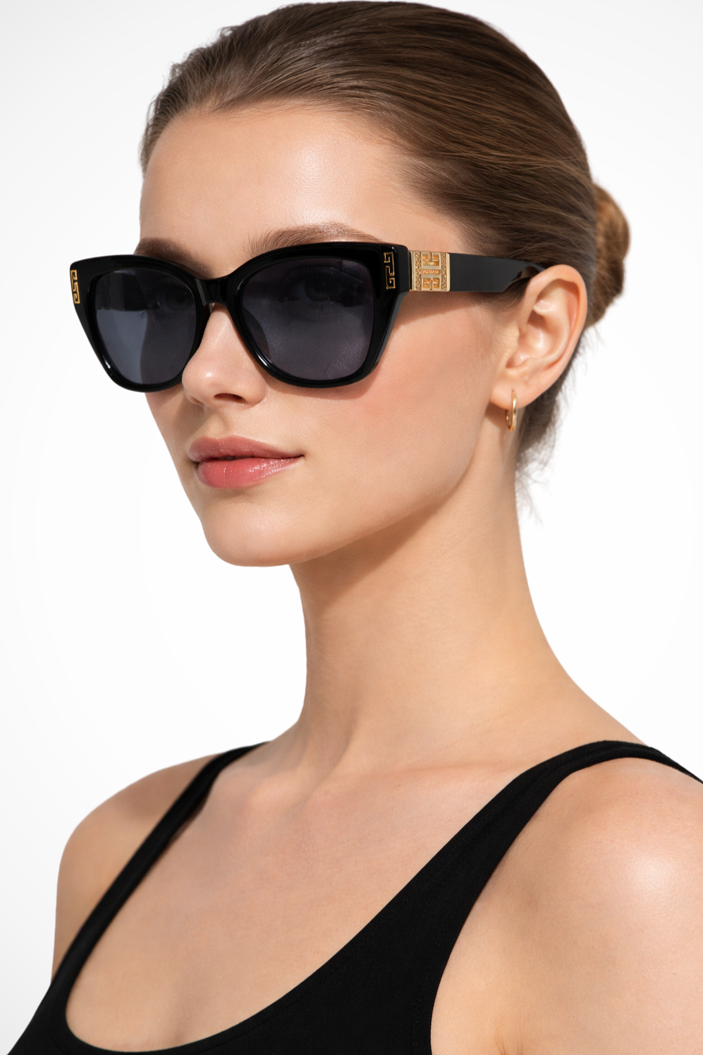 Lunettes de Soleil Femme Forme Œil de Chat et Finition Dorée aux Temples