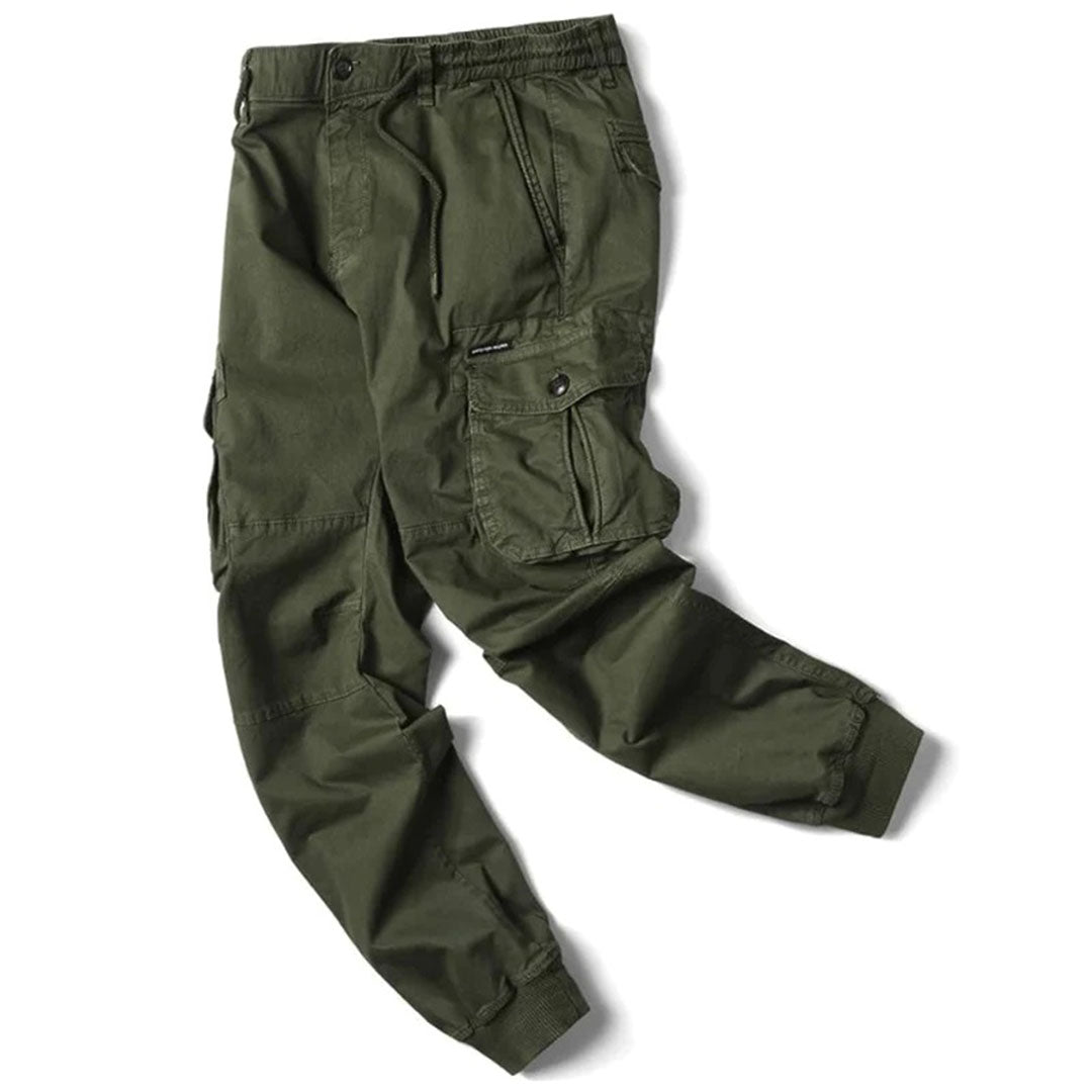 Pantalón cargo de hombre para uso diario, corte cónico, bolsillos utilitarios y tobillos ajustados
