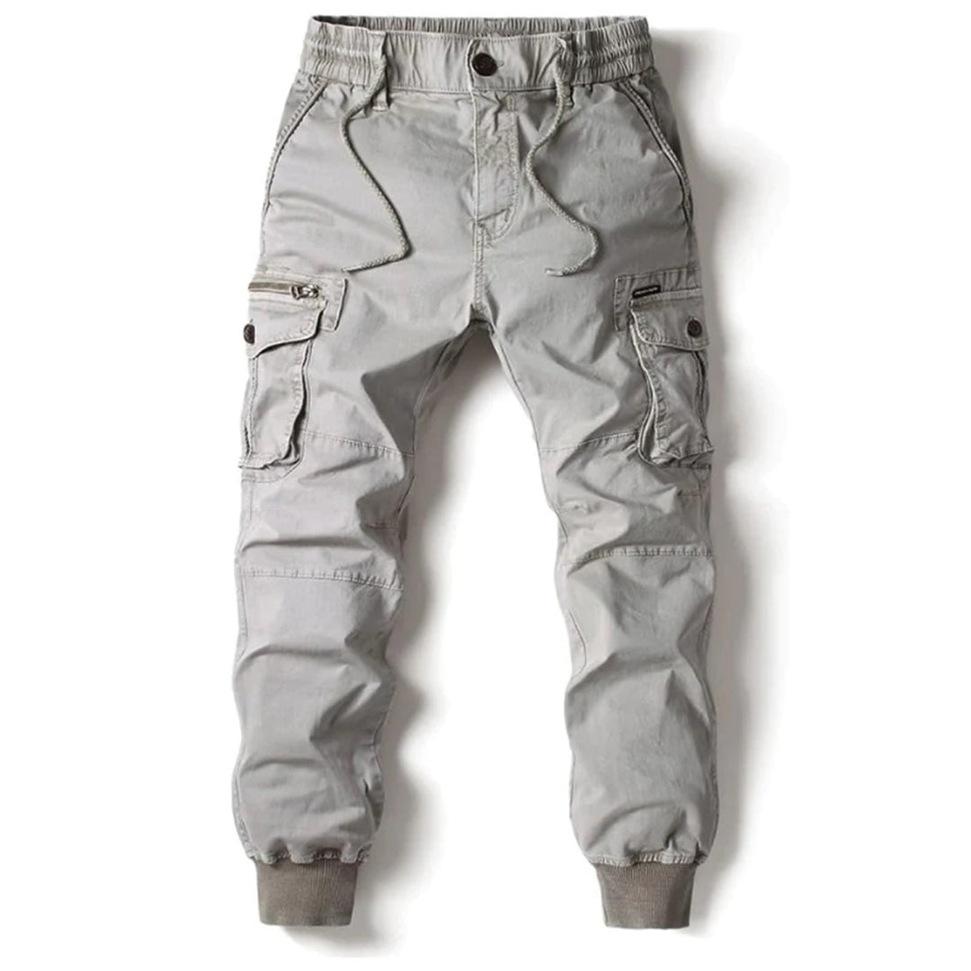 Pantalón cargo de hombre para uso diario, corte cónico, bolsillos utilitarios y tobillos ajustados