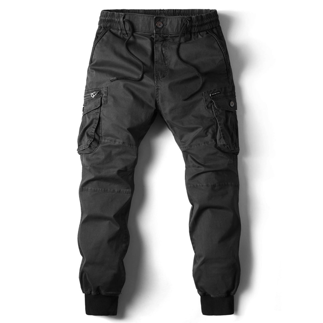 Pantalón cargo de hombre para uso diario, corte cónico, bolsillos utilitarios y tobillos ajustados