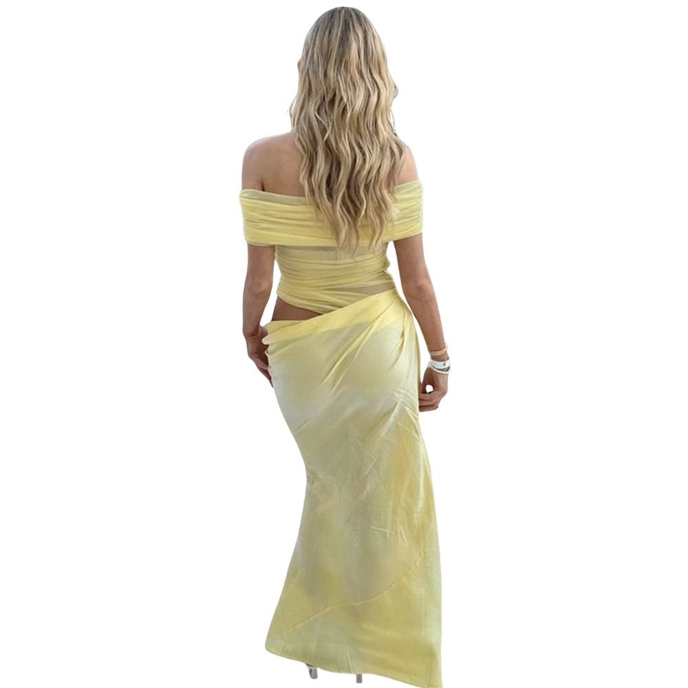 Vestito lungo da sera aderente con spalle scoperte, taglio e effetto drappeggiato